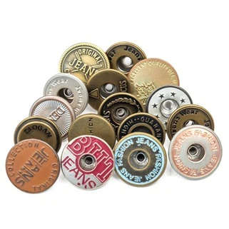 Tlačidlo starožitných medených džínsov